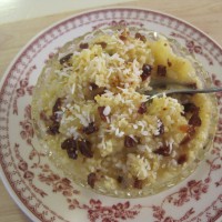 Prosena kaša z jabolčno čežano, kokosom in suhimi brusnicami